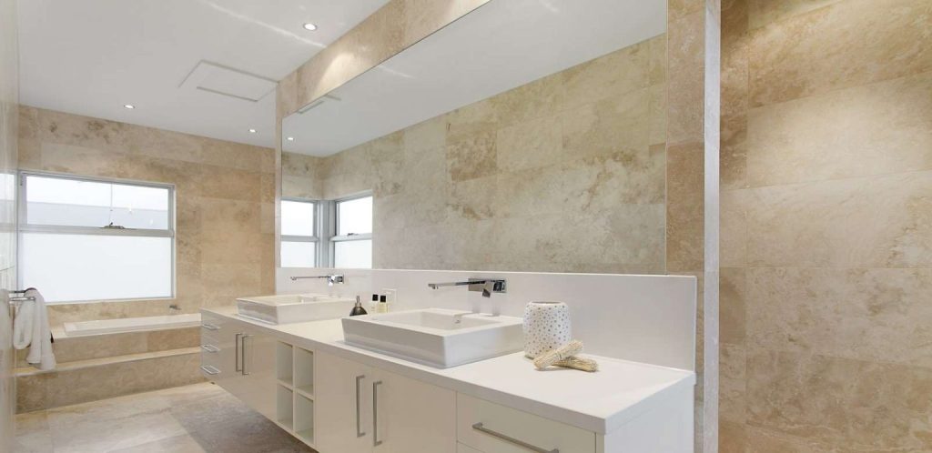 Travertine tiles and slabs bathroom